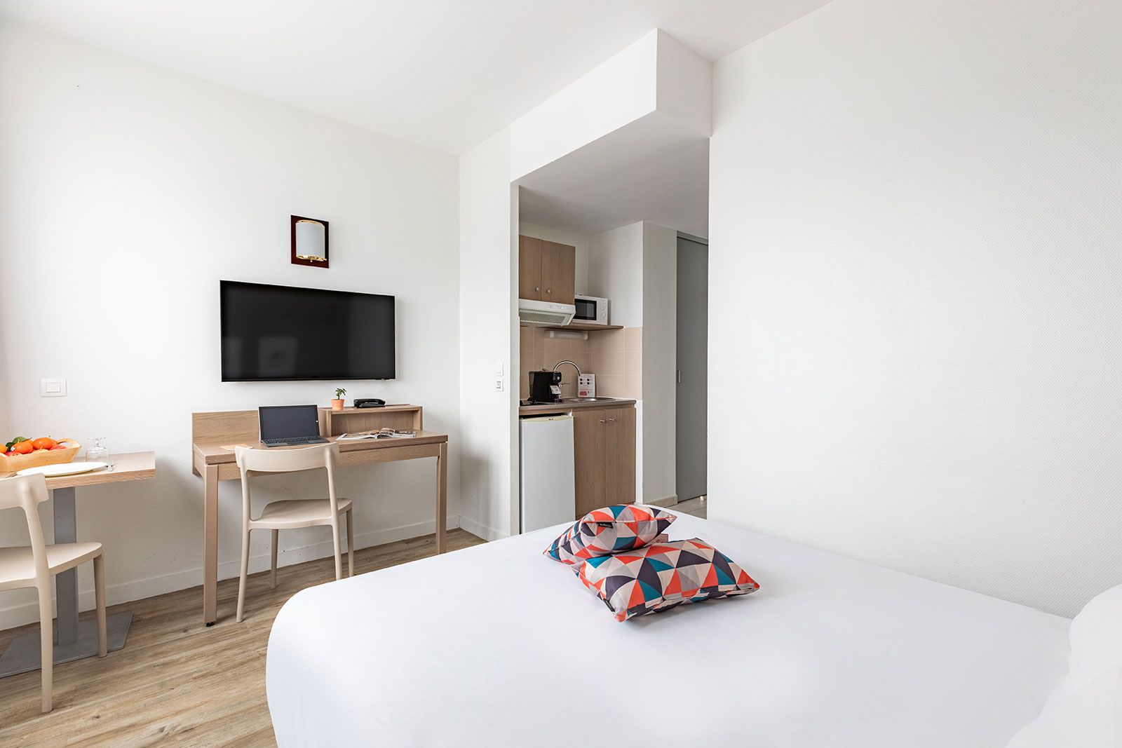 Appart’City Le Mans studio with bed desk kitchenette